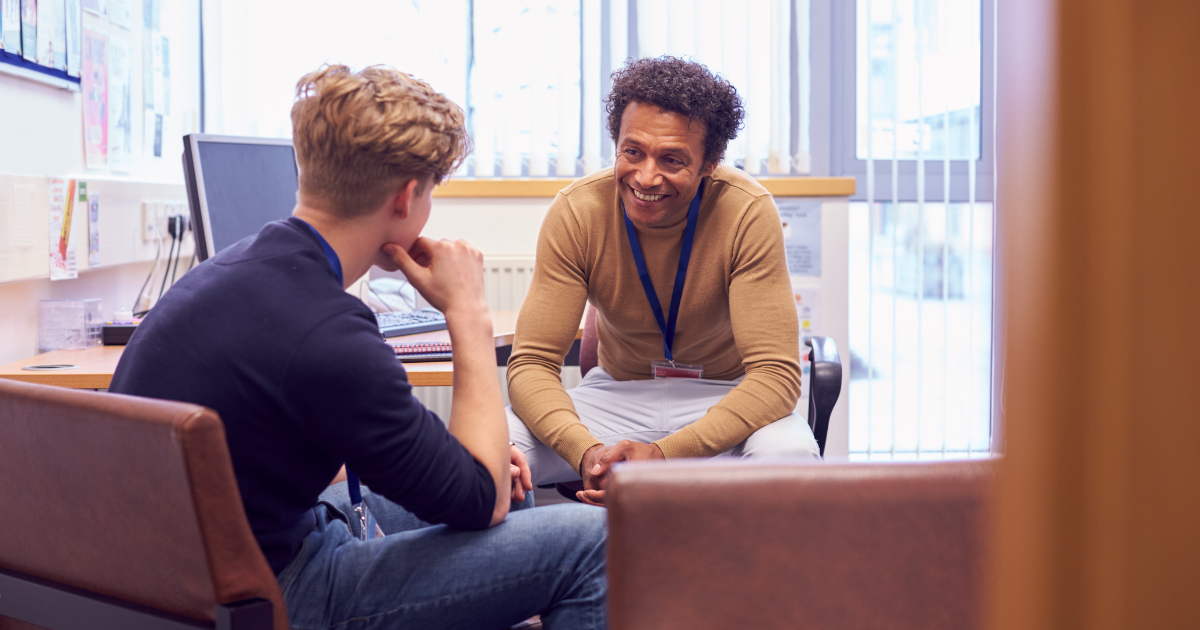 A counselor meeting with a patient for a therapy session, symbolizing the importance of expanded access to treatment programs for sustainable recovery.