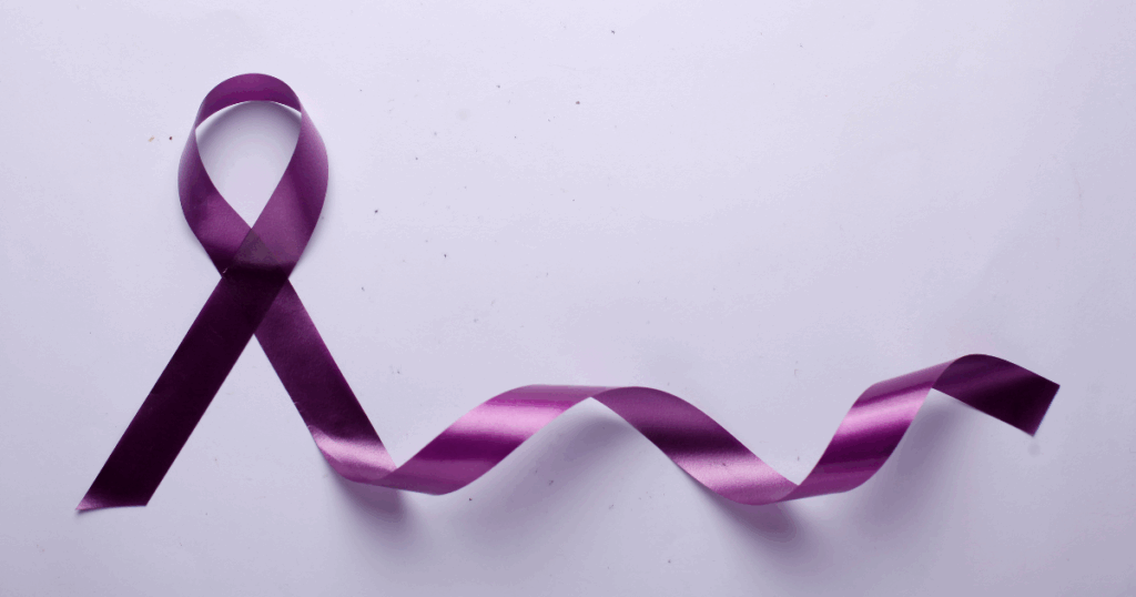 Purple awareness ribbon symbolizing recovery and hope for addiction treatment and behavioral health during National Recovery Month.