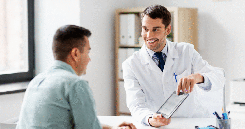 A physician supporting a patient in recovery, discussing medications and treatment planning for opioid use disorder (OUD).
