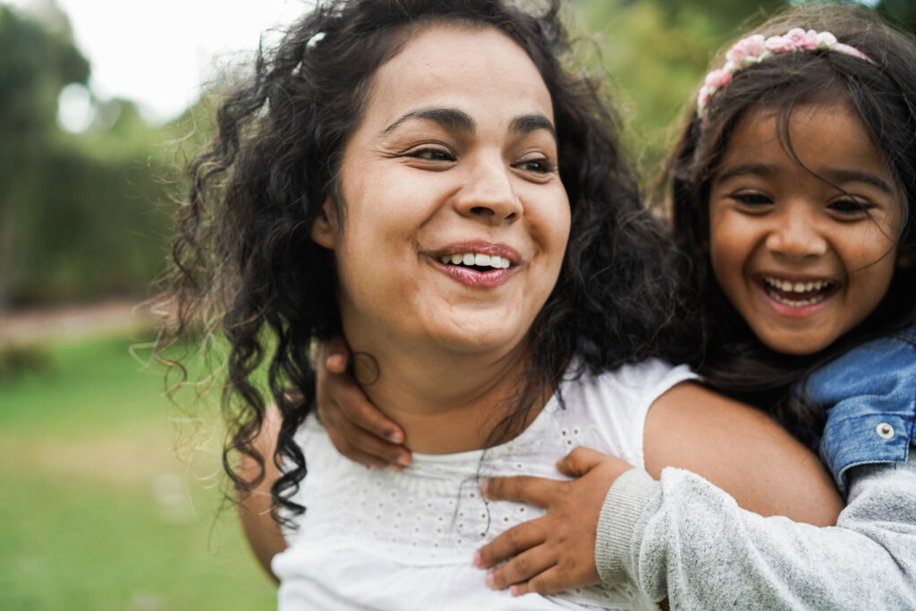 Mother and daughter enjoying quality time outdoors, reflecting work life balance at BHG