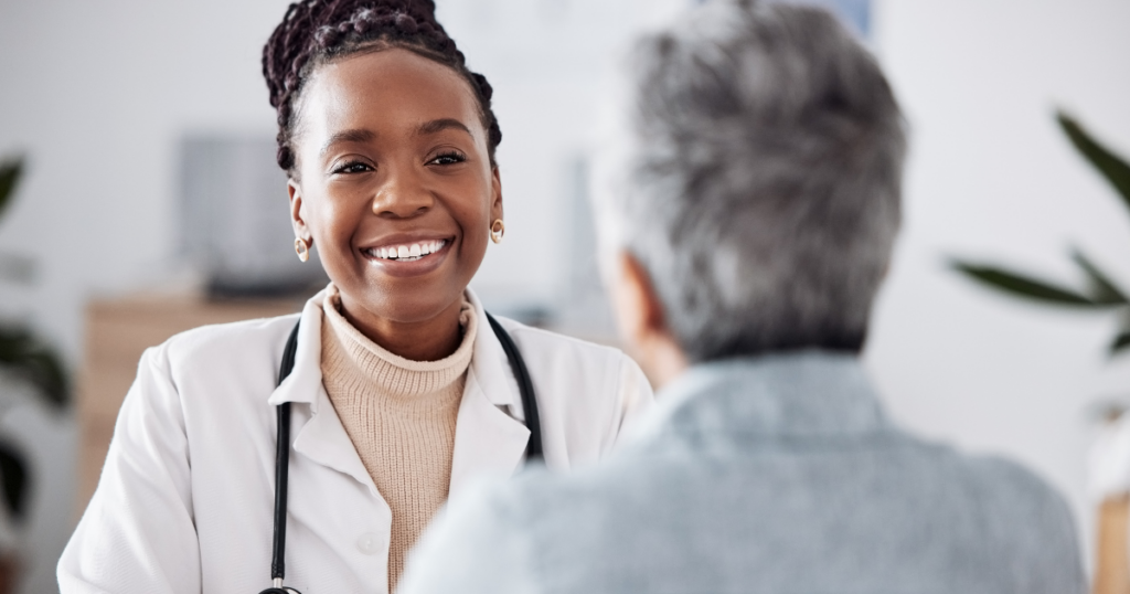 Healthcare provider and patient discussing Suboxone vs methadone treatment options for opioid use disorder in a clinical setting.