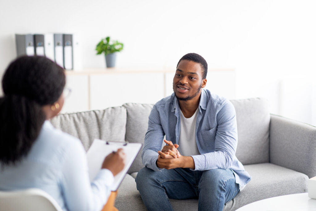 Patient speaking with treatment provider about recovery and medication-assisted treatment.