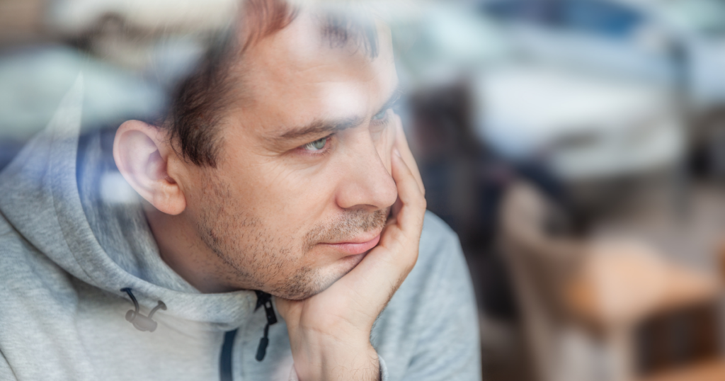 Individual reflecting on recovery and the impact of substance use disorder on brain health.