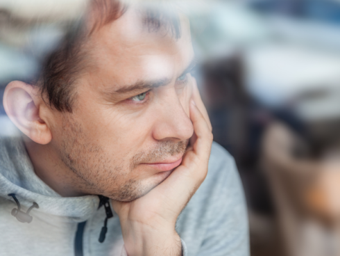 Individual reflecting on recovery and the impact of substance use disorder on brain health.