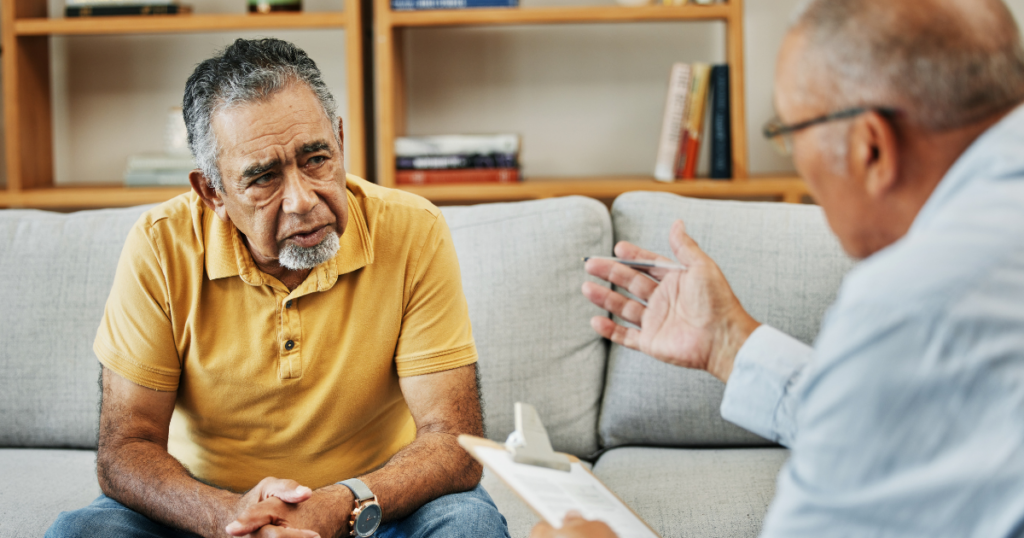 Person in a recovery meeting with a counselor to address co-occurring mental health and substance use disorders.