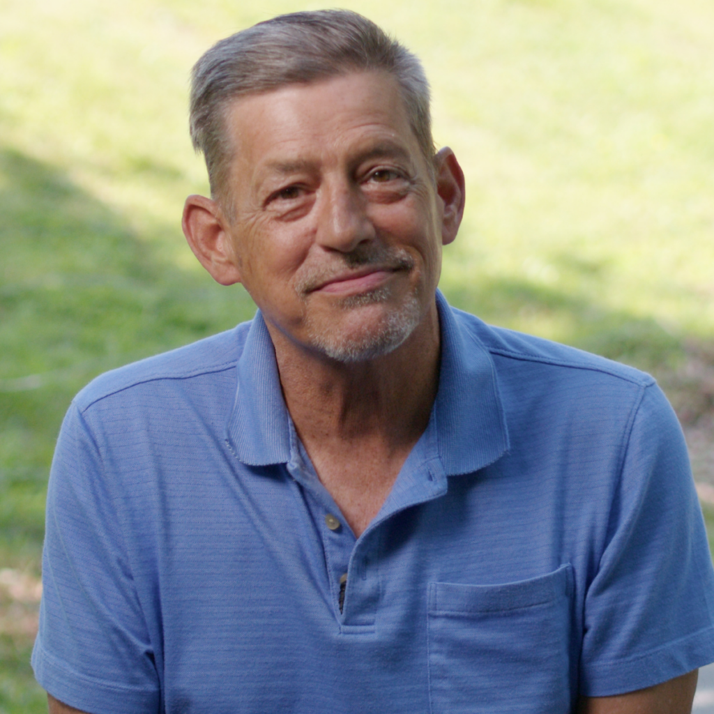 Photo of BHG patient Lonnie smiling at the camera as he shares his recovery story from opioid use disorder.