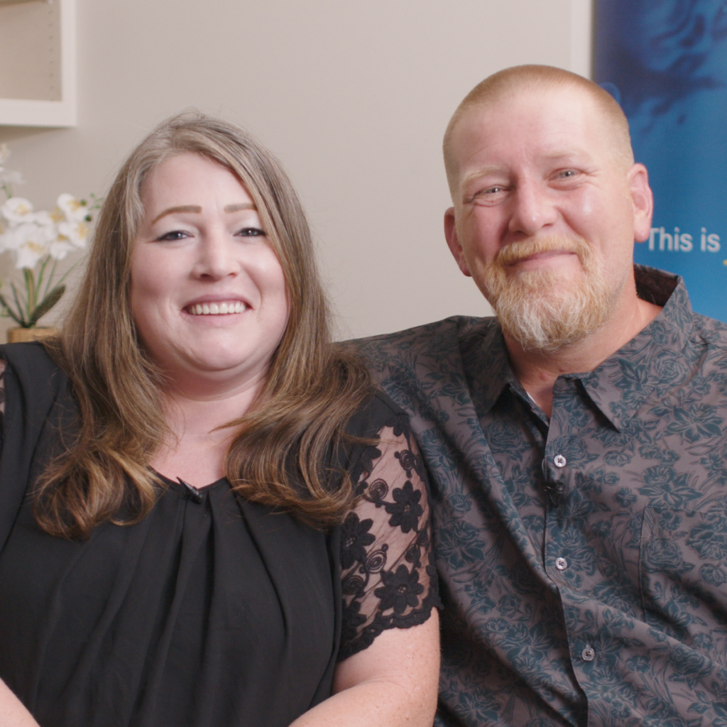 Photo of BHG patients Tiffany and Caleb smiling as they share their story of love and recovery from opioid use disorder.