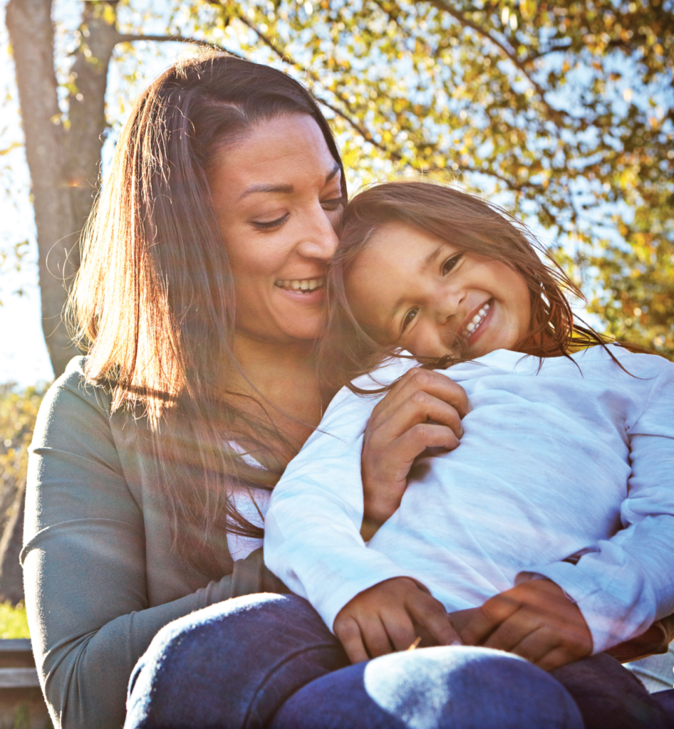 Mother and daughter spending time together while she stays engaged in virtual take-home methadone treatment.
